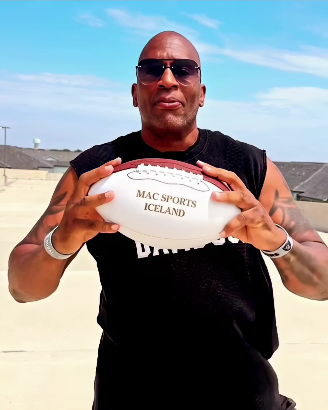 Demetrus holding a MAC Sports Iceland football